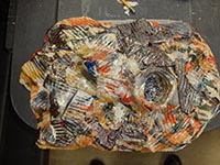 wall hanging with orange, brown, and some blue